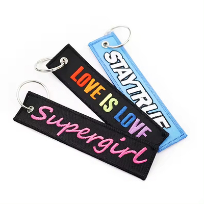 Logo personalizzabile chiavetta ricamata tag chiavetta a strisce di nylon togliere prima del volo
