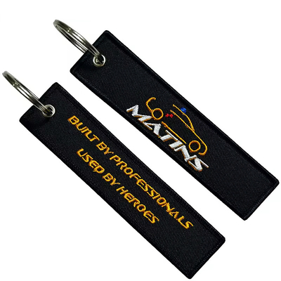 Al dettaglio Olecranon Hook Barato Fabrica di volo personalizzata ricamo Jet tag Portachiavi tessuti con il tuo logo