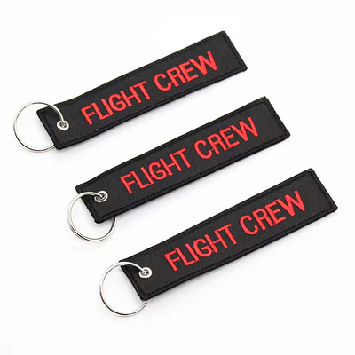 Al dettaglio Olecranon Hook Barato Fabrica di volo personalizzata ricamo Jet tag Portachiavi tessuti con il tuo logo