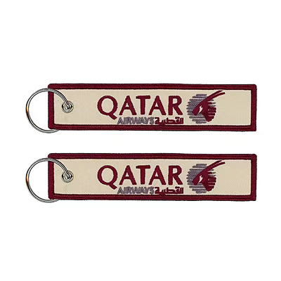 Al dettaglio Olecranon Hook Barato Fabrica di volo personalizzata ricamo Jet tag Portachiavi tessuti con il tuo logo
