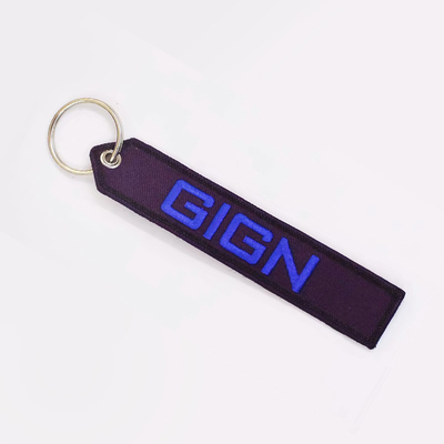 Logo personalizzato Jet Tags Tessuto Stampato Ring chiavi ricamati Ricamo Portachiavi
