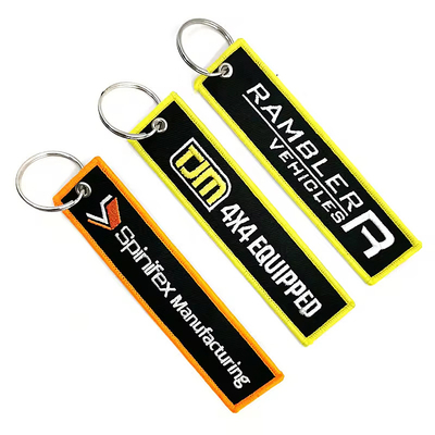 Logo personalizzato Jet Tags Tessuto Stampato Ring chiavi ricamati Ricamo Portachiavi